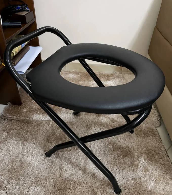 Chaise toillete pliable